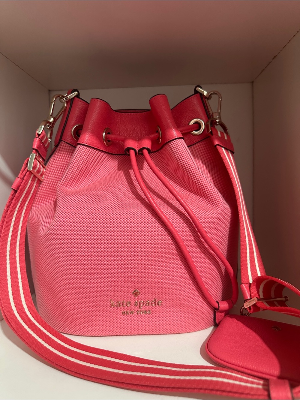 kate spade coral Pink Drawstring Bucket Shoulder Bag with Striped Strap